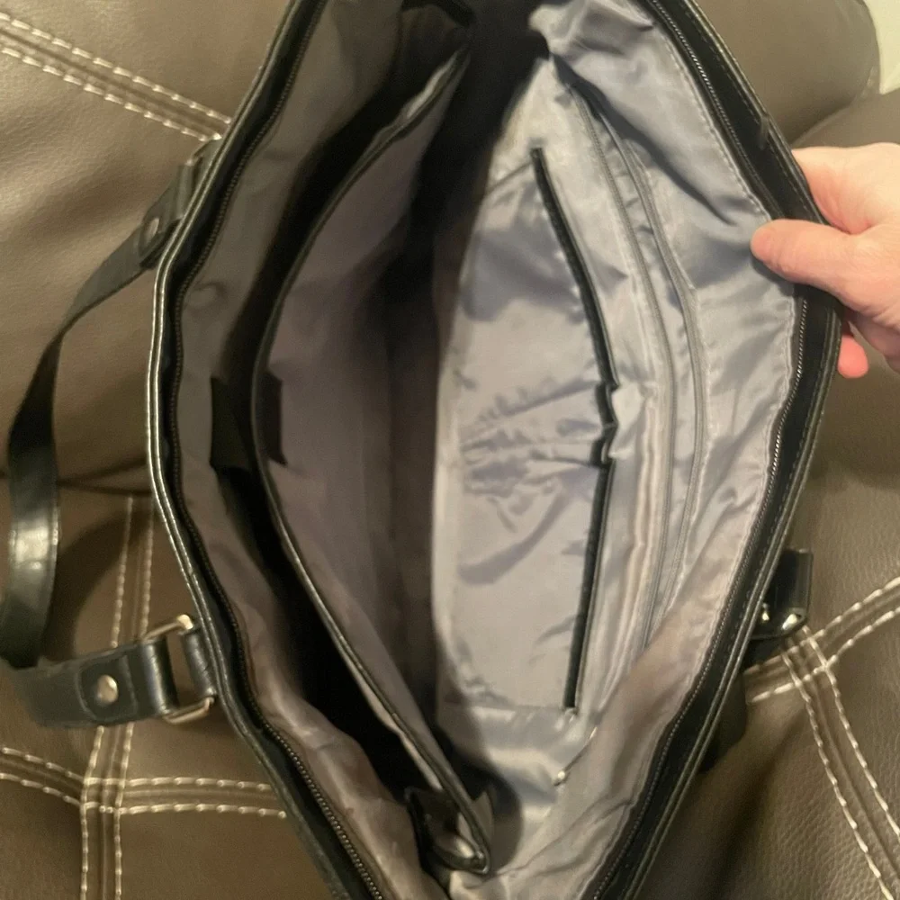 Franklin Covey Black laptop bag/purse.